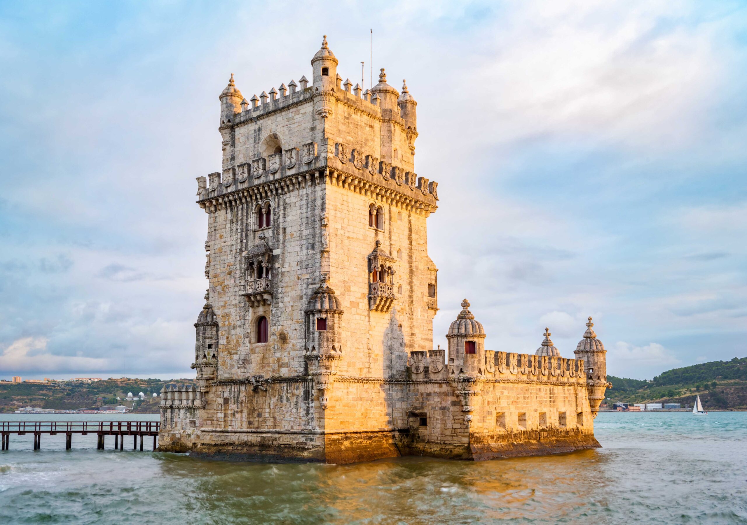 Lisbon, Portugal - October 16, 2019: View of Belem Tower at sunset. Copy space in sky.